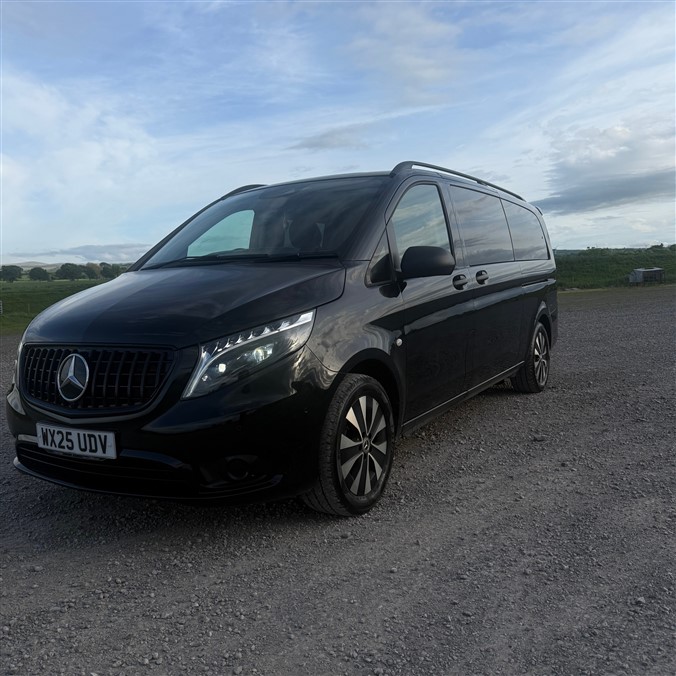 Silver Mercedes 8 seater mini-bus